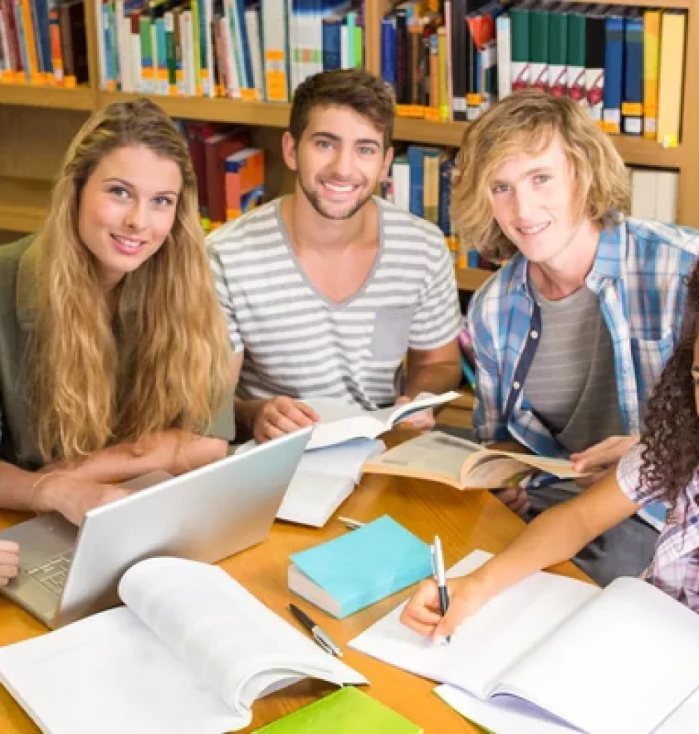 depositphotos_68987555-stock-photo-college-students-doing-homework-in
